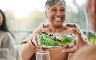 Woman holding salad