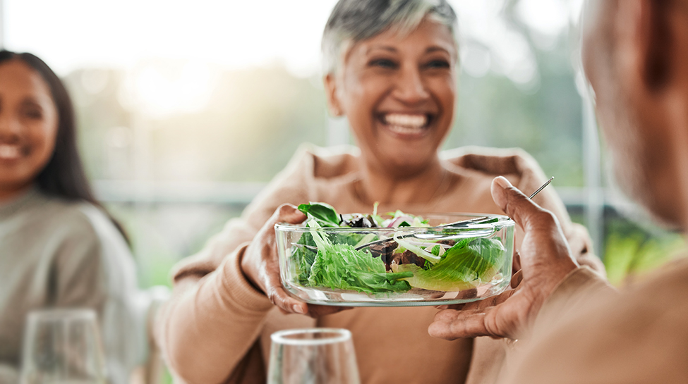 Woman holding salad